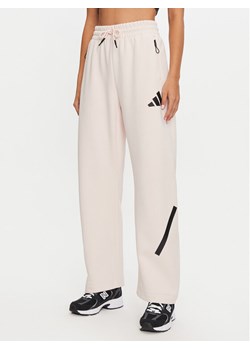 adidas Spodnie dresowe Z.N.E. Barrel JF4780 Różowy Loose Fit ze sklepu MODIVO w kategorii Spodnie damskie - zdjęcie 182673198