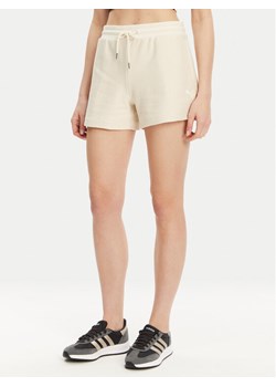 Puma Szorty sportowe Ess 629782 Beżowy Regular Fit ze sklepu MODIVO w kategorii Szorty - zdjęcie 182673377