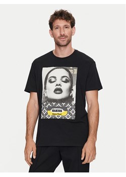Guess T-Shirt M4YI90 K9RM1 Czarny Regular Fit ze sklepu MODIVO w kategorii T-shirty męskie - zdjęcie 182673629