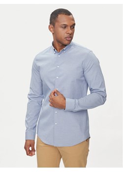 Calvin Klein Koszula Chambray K10K112679 Niebieski Slim Fit ze sklepu MODIVO w kategorii Koszule męskie - zdjęcie 182673775