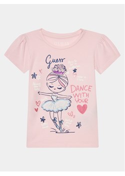 Guess T-Shirt K4RI21 K6YW4 Różowy Regular Fit ze sklepu MODIVO w kategorii Bluzki dziewczęce - zdjęcie 182674909