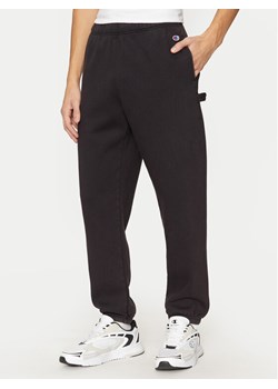 Champion Spodnie dresowe 220513 Czarny Regular Fit ze sklepu MODIVO w kategorii Spodnie męskie - zdjęcie 182675015