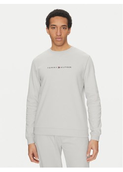 Tommy Hilfiger Bluza UM0UM03346 Beżowy Regular Fit ze sklepu MODIVO w kategorii Bluzy męskie - zdjęcie 182677995