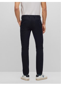 Boss Spodnie materiałowe Kaito1_T 50487754 Granatowy Slim Fit ze sklepu MODIVO w kategorii Spodnie męskie - zdjęcie 182680498