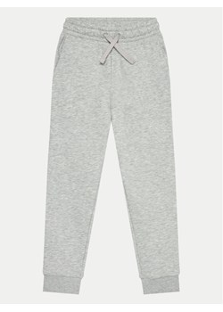 4F Spodnie dresowe 4FJWMM00TTROF0828 Szary Regular Fit ze sklepu MODIVO w kategorii Spodnie chłopięce - zdjęcie 182680685