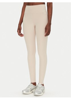 Girlfriend Collective Legginsy Rib High-Rise 4034 Beżowy Slim Fit ze sklepu MODIVO w kategorii Spodnie damskie - zdjęcie 182681688