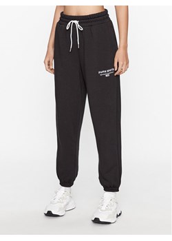 Puma Spodnie dresowe Puma Team 621442 Czarny Regular Fit ze sklepu MODIVO w kategorii Spodnie damskie - zdjęcie 182682496