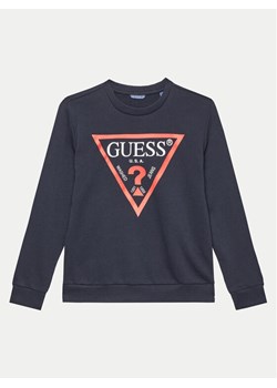 Guess Bluza L73Q09 KAUG0 Granatowy Regular Fit ze sklepu MODIVO w kategorii Bluzy chłopięce - zdjęcie 182682698