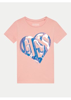 Guess T-Shirt J4YI42 K6YW4 Różowy Regular Fit ze sklepu MODIVO w kategorii Bluzki dziewczęce - zdjęcie 182682716