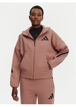 adidas Bluza Z.N.E. JC5394 Różowy Loose Fit ze sklepu MODIVO w kategorii Bluzy damskie - zdjęcie 182683647