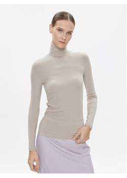Calvin Klein Golf K20K206053 Beżowy Slim Fit ze sklepu MODIVO w kategorii Bluzki damskie - zdjęcie 182684146