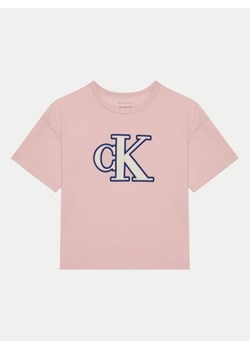 Calvin Klein Jeans T-Shirt IG0IG02806 Różowy Boxy Fit ze sklepu MODIVO w kategorii Bluzki dziewczęce - zdjęcie 182684558