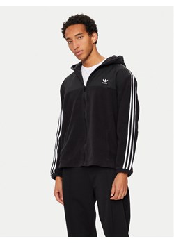 adidas Bluza adicolor 3-Stripes Teddy IZ4802 Czarny Regular Fit ze sklepu MODIVO w kategorii Bluzy męskie - zdjęcie 182685939