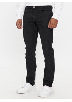 Calvin Klein Jeansy K10K111429 Czarny Slim Fit ze sklepu MODIVO w kategorii Jeansy męskie - zdjęcie 182686336