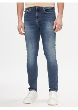 Calvin Klein Jeans Jeansy Skinny J30J324198 Granatowy Skinny Fit ze sklepu MODIVO w kategorii Jeansy męskie - zdjęcie 182687569