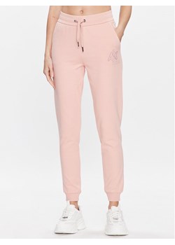 Armani Exchange Spodnie dresowe 3RYP94 YJCZZ 14AO Różowy Regular Fit ze sklepu MODIVO w kategorii Spodnie damskie - zdjęcie 182688318
