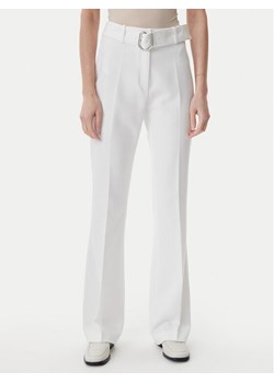 HUGO Spodnie materiałowe 50537602 Biały Flare Fit ze sklepu MODIVO w kategorii Spodnie damskie - zdjęcie 182688489