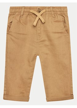 United Colors Of Benetton Spodnie materiałowe 4BE7GF01H Beżowy Regular Fit ze sklepu MODIVO w kategorii Spodnie chłopięce - zdjęcie 182690045