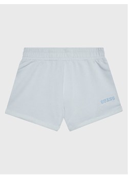 Guess Szorty materiałowe J3GD02 KA6R3 Niebieski Regular Fit ze sklepu MODIVO w kategorii Spodenki dziewczęce - zdjęcie 182690769