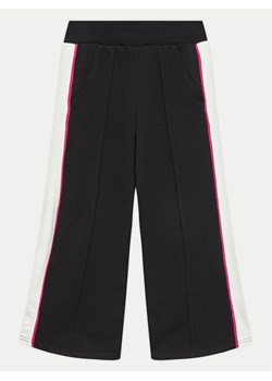 United Colors Of Benetton Spodnie dresowe 330SCF05B Czarny Wide Leg ze sklepu MODIVO w kategorii Spodnie chłopięce - zdjęcie 182690996