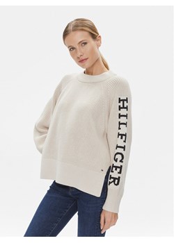 Tommy Hilfiger Sweter WW0WW39002 Beżowy Regular Fit ze sklepu MODIVO w kategorii Swetry damskie - zdjęcie 182692119