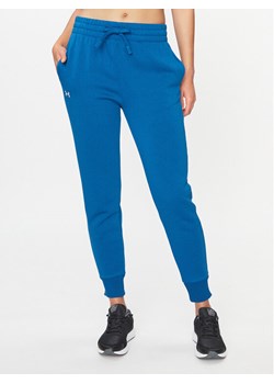 Under Armour Spodnie dresowe Ua Rival Fleece Jogger 1379438 Niebieski Loose Fit ze sklepu MODIVO w kategorii Spodnie damskie - zdjęcie 182692696