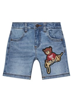 Guess Szorty jeansowe N5GD14 D4CA0 Niebieski Regular Fit ze sklepu MODIVO w kategorii Spodenki chłopięce - zdjęcie 182693298