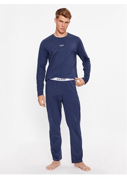 Guess Piżama U2BX00 KBZG0 Niebieski Regular Fit ze sklepu MODIVO w kategorii Piżamy męskie - zdjęcie 182694435