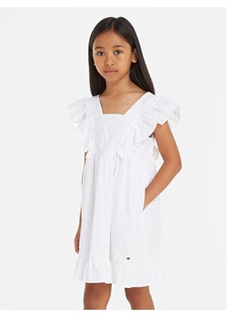 Tommy Hilfiger Sukienka letnia Gingham KG0KG07930 D Biały Relaxed Fit ze sklepu MODIVO w kategorii Sukienki dziewczęce - zdjęcie 182694586