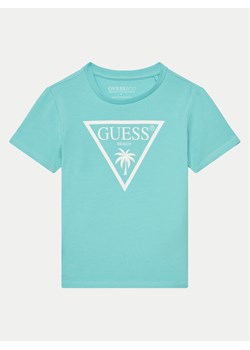 Guess T-Shirt L5GI29 J1314 Turkusowy Regular Fit ze sklepu MODIVO w kategorii T-shirty chłopięce - zdjęcie 182694626