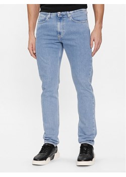 Calvin Klein Jeans Jeansy J30J323690 Niebieski Slim Taper Fit ze sklepu MODIVO w kategorii Jeansy męskie - zdjęcie 182694875
