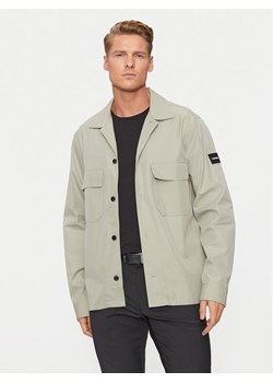 Calvin Klein Koszula K10K109920 Beżowy Regular Fit ze sklepu MODIVO w kategorii Koszule męskie - zdjęcie 182695687