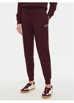 Tommy Hilfiger Spodnie dresowe UW0UW04522 Bordowy Regular Fit ze sklepu MODIVO w kategorii Spodnie damskie - zdjęcie 182695945