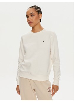 Tommy Hilfiger Spodnie dresowe Varsity WW0WW42584 Beżowy Regular Fit ze sklepu MODIVO w kategorii Spodnie damskie - zdjęcie 182696375