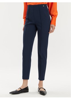 Tamaris Apparel Spodnie materiałowe Arad TAW0880 Granatowy Slim Fit ze sklepu MODIVO w kategorii Spodnie damskie - zdjęcie 182696738