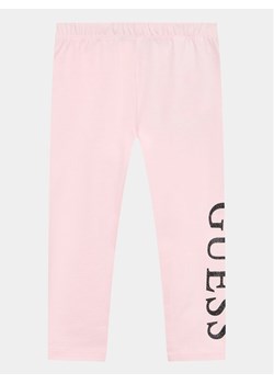 Guess Legginsy K3YB01 K82K0 Różowy Slim Fit ze sklepu MODIVO w kategorii Spodnie dziewczęce - zdjęcie 182697695