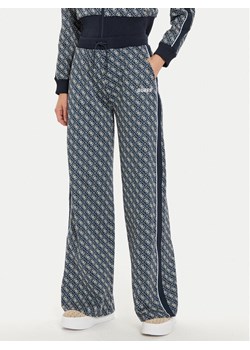 Guess Spodnie dresowe Sarah V4BB09 KCHW0 Niebieski Relaxed Fit ze sklepu MODIVO w kategorii Spodnie damskie - zdjęcie 182697855