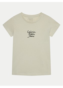 Calvin Klein Jeans T-Shirt IG0IG02805 Écru Slim Fit ze sklepu MODIVO w kategorii Bluzki dziewczęce - zdjęcie 182698026