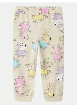 NAME IT Spodnie dresowe Fira Peppa 13240633 Beżowy Regular Fit ze sklepu MODIVO w kategorii Spodnie dziewczęce - zdjęcie 182698148