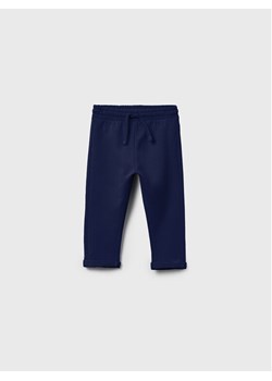 OVS Spodnie dresowe 1597946 Granatowy Regular Fit ze sklepu MODIVO w kategorii Spodnie i półśpiochy - zdjęcie 182698466