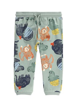 Coccodrillo Spodnie dresowe WC5120102SBN Zielony Regular Fit ze sklepu MODIVO w kategorii Spodnie chłopięce - zdjęcie 182698909