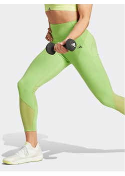 adidas Legginsy Tailored HIIT Training 7/8 Leggings IK4247 Zielony ze sklepu MODIVO w kategorii Spodnie damskie - zdjęcie 182700087