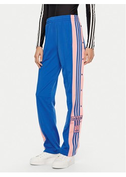 adidas Spodnie dresowe Adibreak JP2307 Niebieski Loose Fit ze sklepu MODIVO w kategorii Spodnie damskie - zdjęcie 182700106