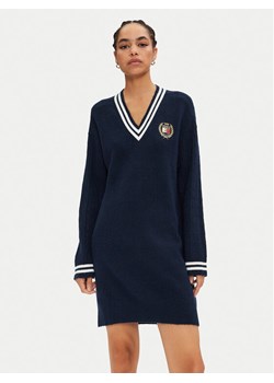 Tommy Jeans Sukienka dzianinowa DW0DW19810 Granatowy Relaxed Fit ze sklepu MODIVO w kategorii Sukienki - zdjęcie 182700199