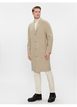 Calvin Klein Płaszcz wełniany K10K111601 Beżowy Regular Fit ze sklepu MODIVO w kategorii Płaszcze męskie - zdjęcie 182700228