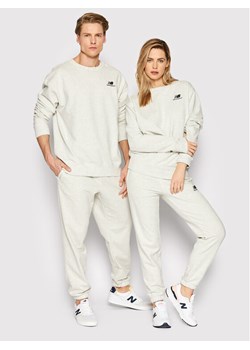 New Balance Spodnie dresowe Unisex UP21500 Szary Ahletic Fit ze sklepu MODIVO w kategorii Spodnie damskie - zdjęcie 182702729