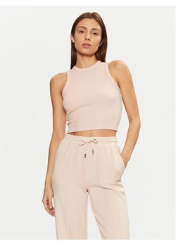 Guess Top V3GP19 K8RT2 Różowy Slim Fit ze sklepu MODIVO w kategorii Bluzki damskie - zdjęcie 182703179