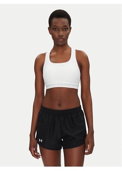 Under Armour Biustonosz sportowy Crossback Mid Bra 1361034 Biały ze sklepu MODIVO w kategorii Biustonosze - zdjęcie 182703557