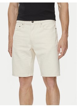 Calvin Klein Szorty jeansowe K10K112942 Écru Regular Fit ze sklepu MODIVO w kategorii Spodenki męskie - zdjęcie 182704205