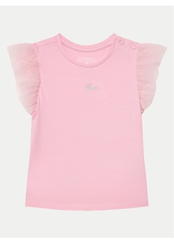 Guess Bluzka K5GI18 K6YW4 Różowy Regular Fit ze sklepu MODIVO w kategorii Bluzki dziewczęce - zdjęcie 182704847